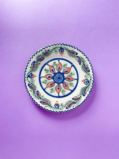 ceramica-baia-mare-liliana-ghilvacs-farfurie-18cm-floare-maro-spirala-albastra-centru-1